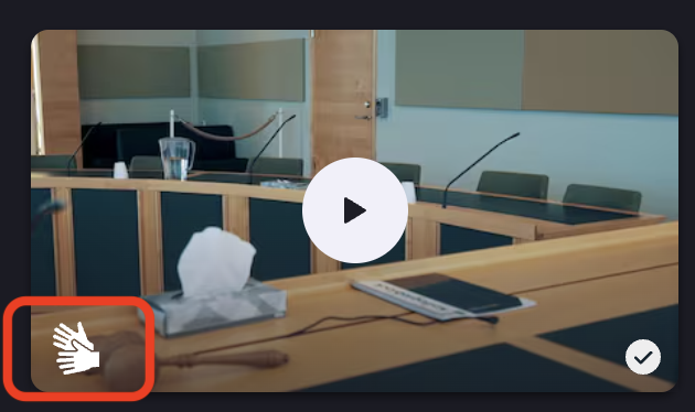 Bilden beskriver hur symbolen för teckenspårk ser ut. Det är två händer bredvid varandra.